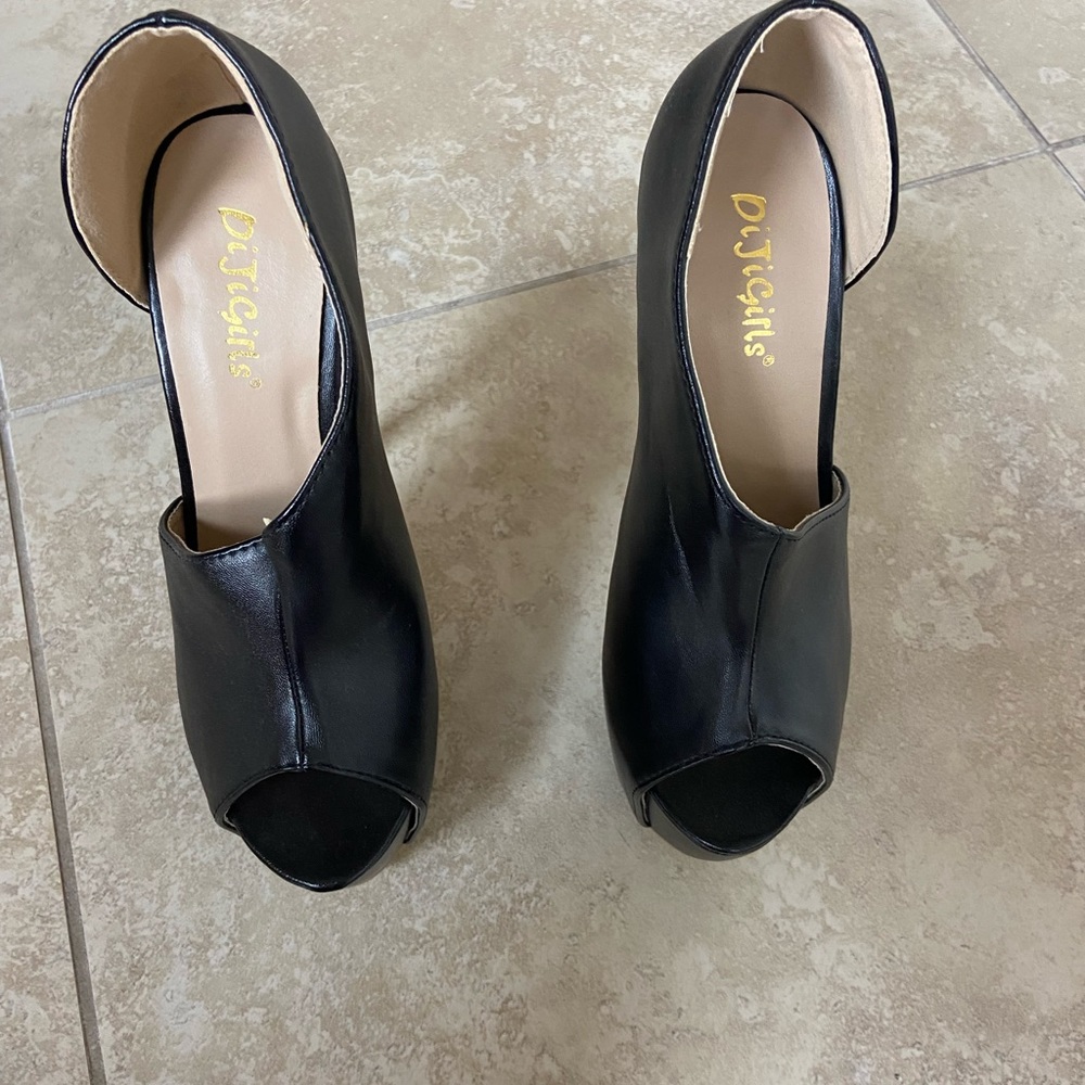 Platform stilettos, heel 6.5 inch, platform 2 inch. Were not use